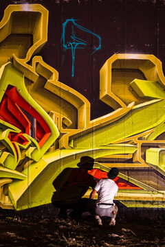 Graffiti artist painting