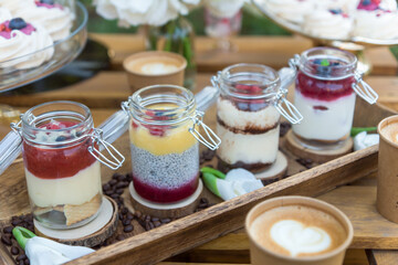 delicious summer berry desserts in decorative jars.
