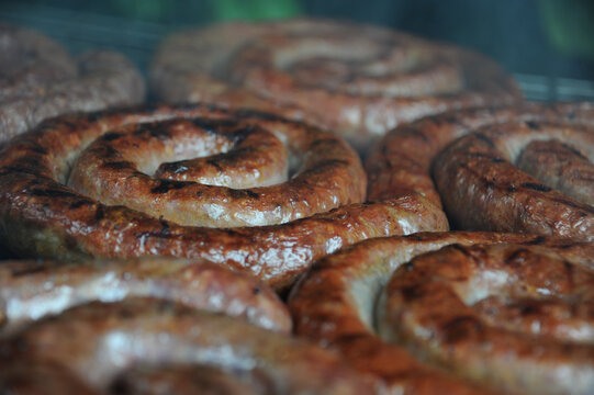 Delicious Traditional South African Boerewors Sausage being grilled on a BBQ