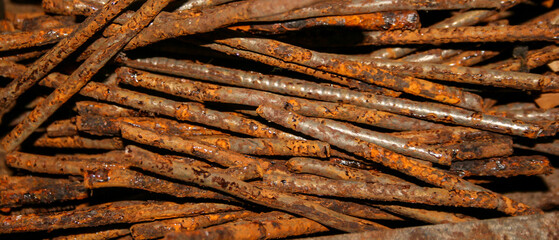 Industrial pattern of rusty long nails