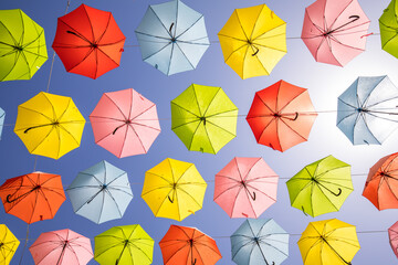 colorful umbrellas in the blue sky