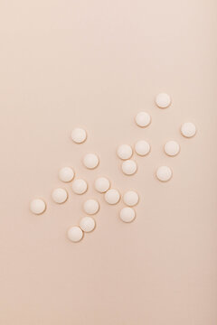 Tablets beige on beige background