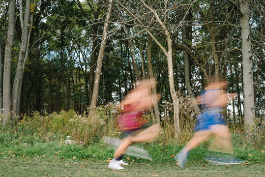 Blurry cross country high-schoolers