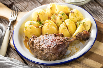 Roasted duck leg.