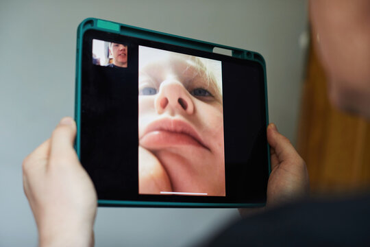 Father and son video calling