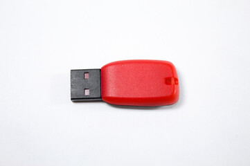 Flash drive with black and red colors and white background