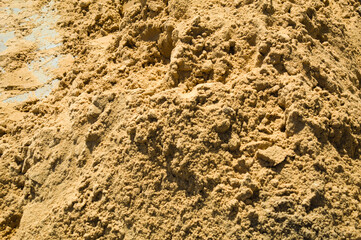 Sand and its texture placed in piles of a building.