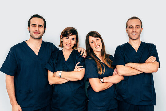 Happy medical team over white background