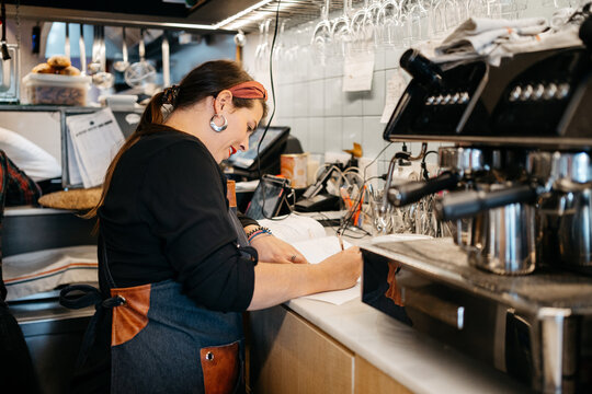 Restaurant owner preparing the orders