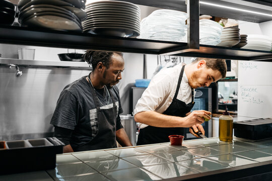 Multiethnic cooks in a restaurant's kitchen