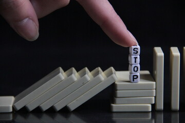 white dominoes and risk