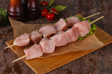 Raw pork meat skewer for grill