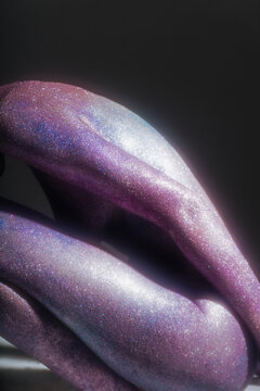 naked female body in a beautiful space body painting without a face