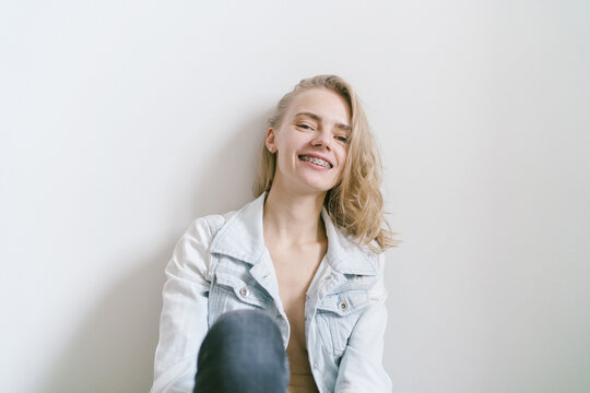 Young Woman With Braces, Smiling