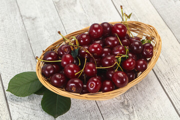 Sweet ripe cherry with leaves