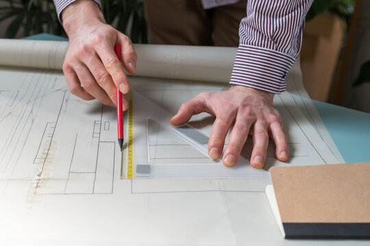 Architect drawing on a paper project