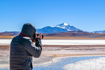 Man Taking Photos, Brava Lagoon, La Rioja, Argentina © DFLC