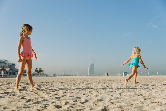 Two girls on the beach in Dubai