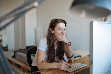 young woman working from home