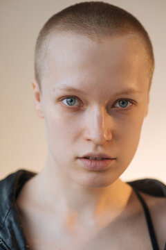 close up androgynous bald girl