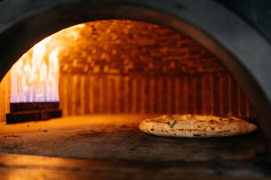 Preparing pizza in a restaurant