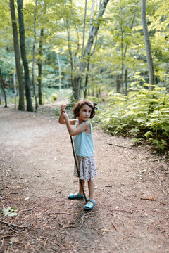 Kid hiking in the forest