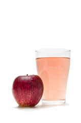 ripe apples and fresh juice in a glass