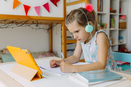 Girl learning at home