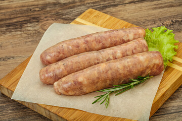 Raw pork meat sausages for grill