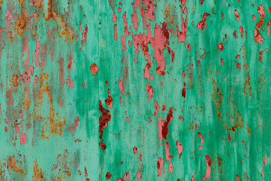 Texture of green and red metallic oxidized wall