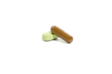 capsules and tablets, the drug on a light background