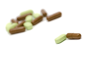 capsules and tablets, the drug on a light background
