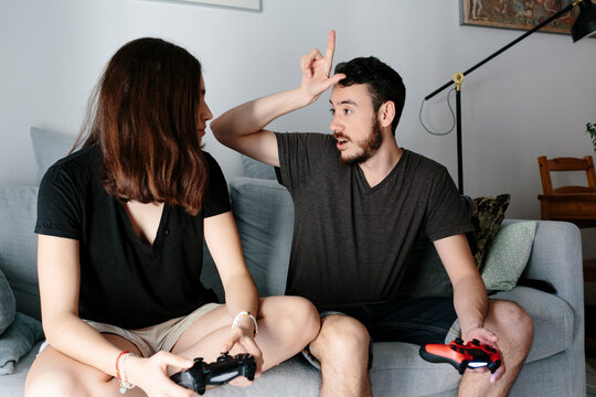 Young couple playing video game