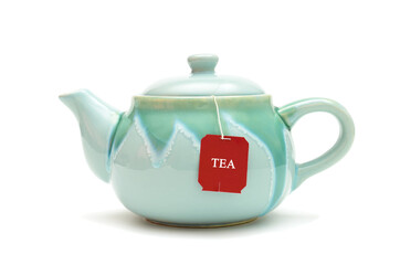 teapot, tea bags isolated on white background