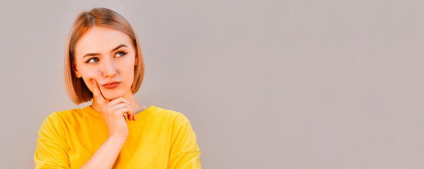 Portrait of an attractive fashionable young blond woman.