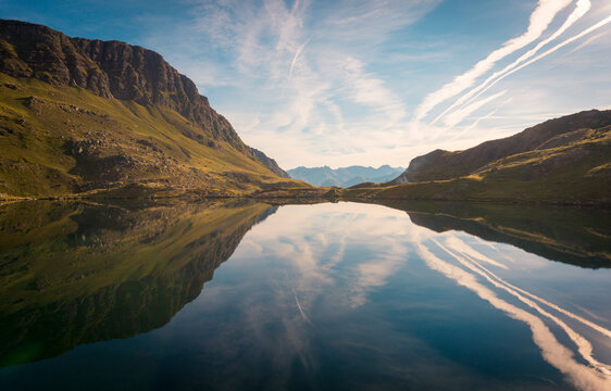 Breathtaking scenery of mountain ridge and calm lake in summer