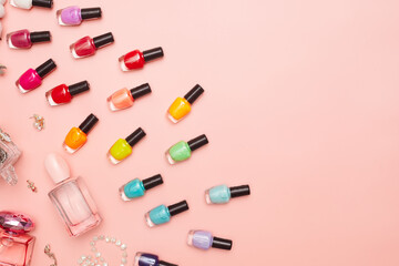 concept, manicure with nail polish, pedicure on pink background, copy space, Flat Lay