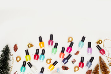 christmas concept, new year, manicure with nail polish, pedicure on white background, copy space, Flat Lay