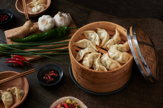 Chinese steamed dumplings made by vegetables and pork.