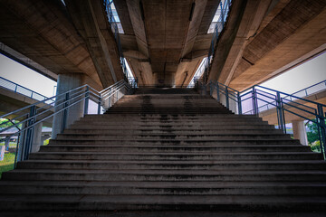 Fototapeta premium Walkway under the bridge over Ada in Serbia's capital