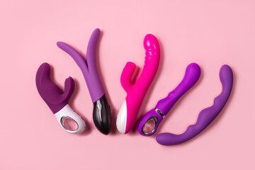 on a pink background sex product, toy for adults