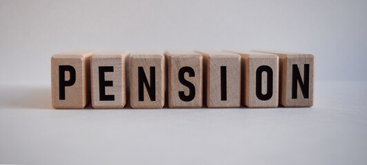 word PENSION, inscription on wooden cubes on white background