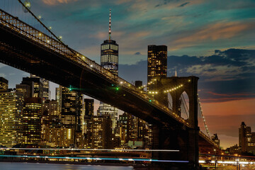 Fototapeta na wymiar Brooklyn Bridge panorama at sunset New York City Manhattan after sunset beautiful cityscape
