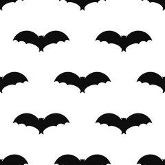 Naklejka premium Bat icon on white background. Symbol of Halloween. Seamless pattern bats isolated silhouette.
