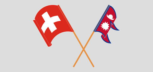 Crossed and waving flags of Nepal and Switzerland