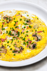 egg omelette with mushrooms and bacon