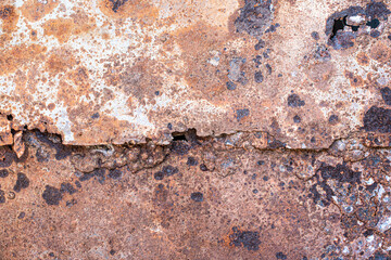 texture of orange rusty wall. metal corrosion, old cracked surface. background for your design.