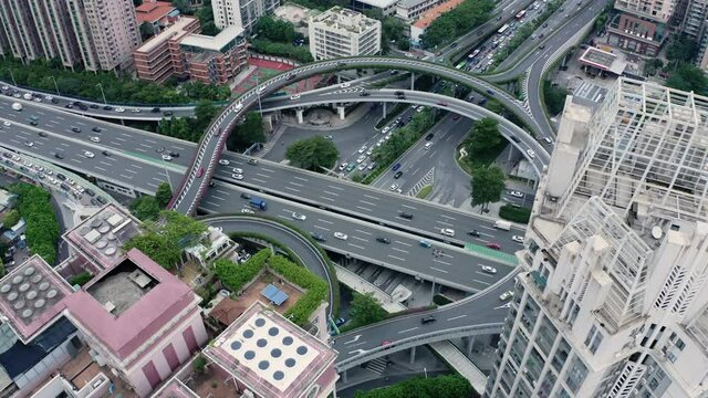 Time-lapse of a multi layer road intersection with heavy traffic. Guangzhou, China