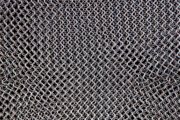 chain mail close up texture background. abstract iron ring backdrop. protection concept