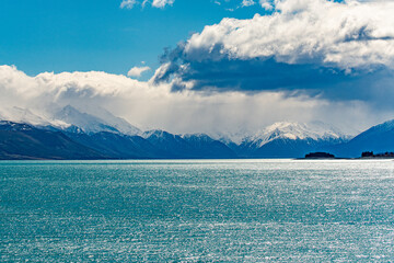 landscape with lake and blue sky and clouds